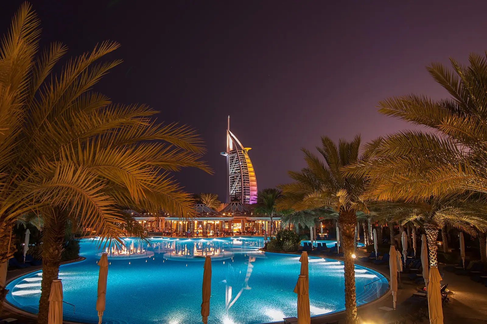 The Burj Al Arab hotel in Dubai illuminated at night