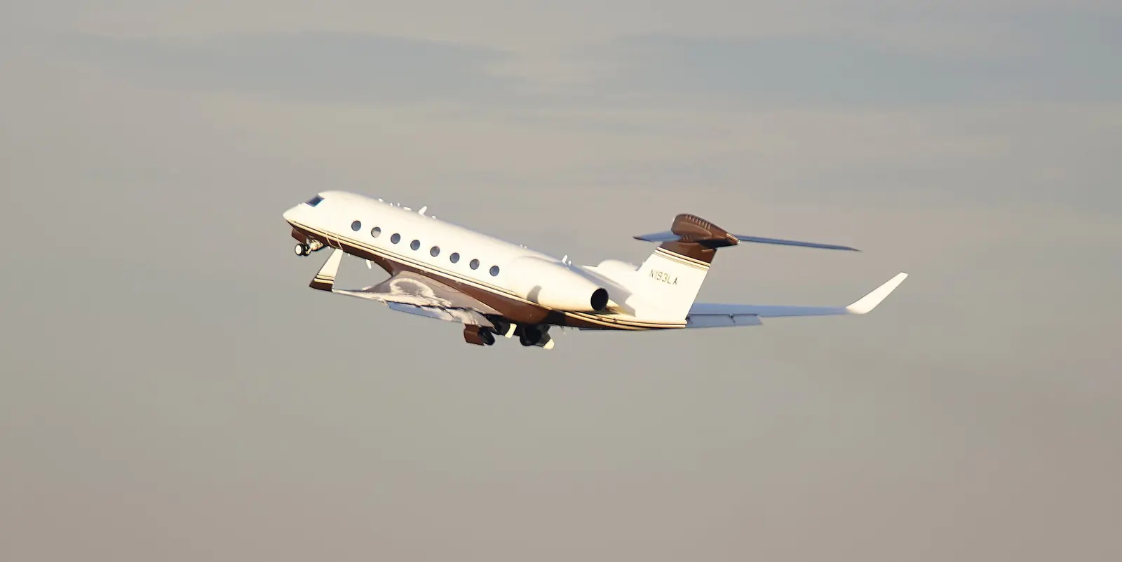 A Gulfstream private jet in flight