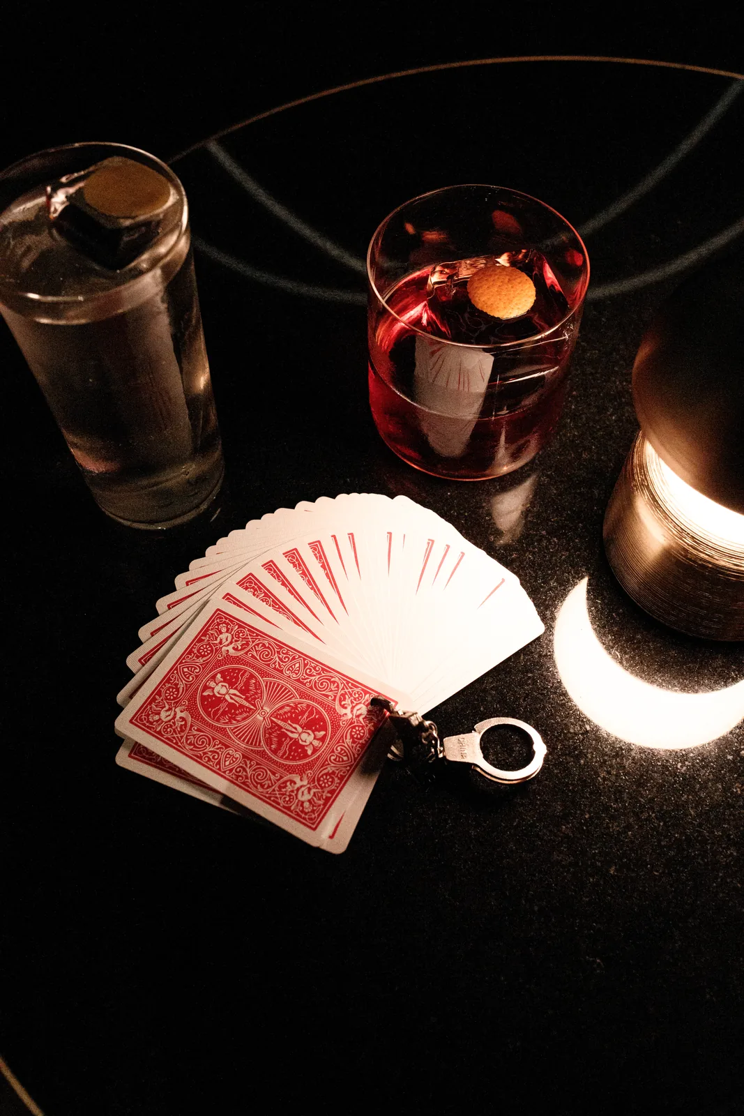 Playing cards and cocktails — a quiet detail from an evening at W Budapest
